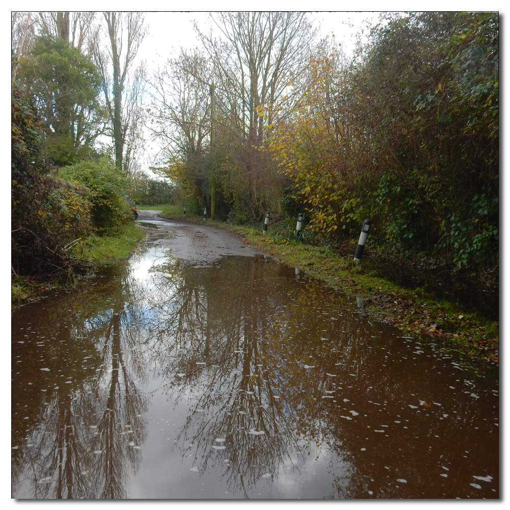 Shooting into the sun, Church lane still underwater